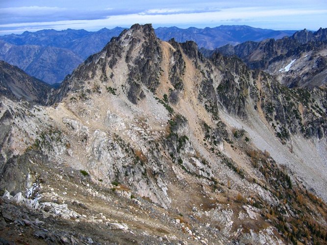 Looking NE, here's Emerald from Saska, showing the long gray talus gully that leads to the summit.
This view gave us a good chance to study our route, 
in hopes that for once we would avoid wandering off route into a steeper approach.